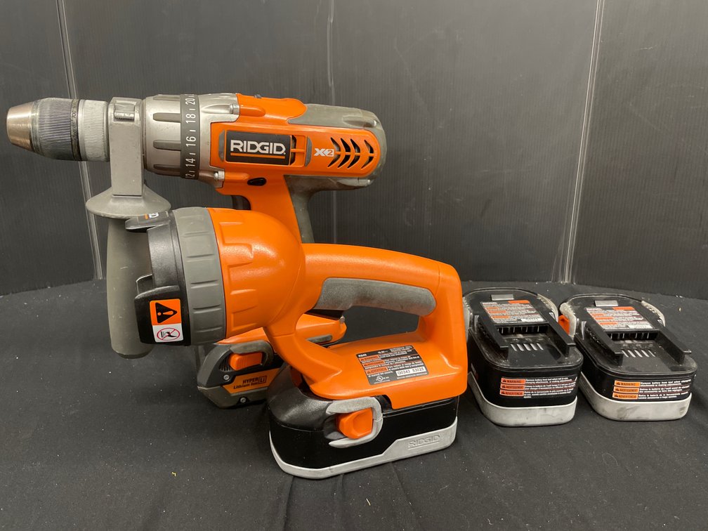 RIDGID R841150 18V Hammer Drill, Work Light, and Four Batteries