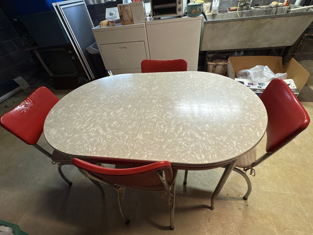 Laminate Dinette Table and Four Red Vinyl Chairs