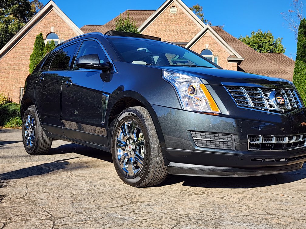 2014 Cadillac SRX VIN: 3GYFNBE35ES613834