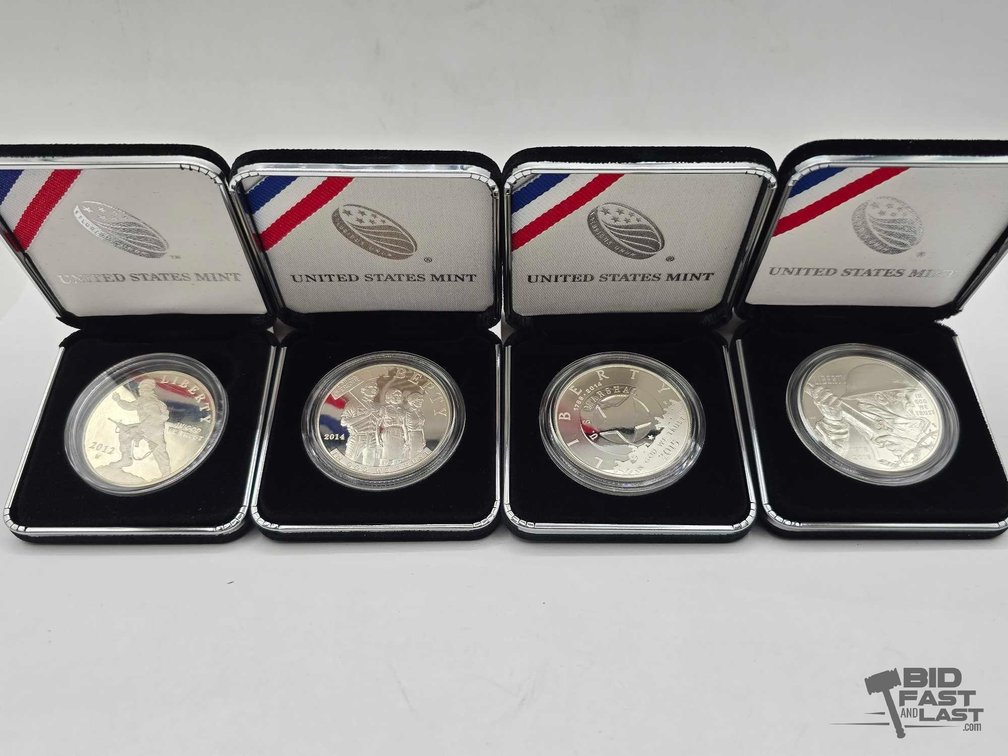 (4) Commemorative Silver Dollars