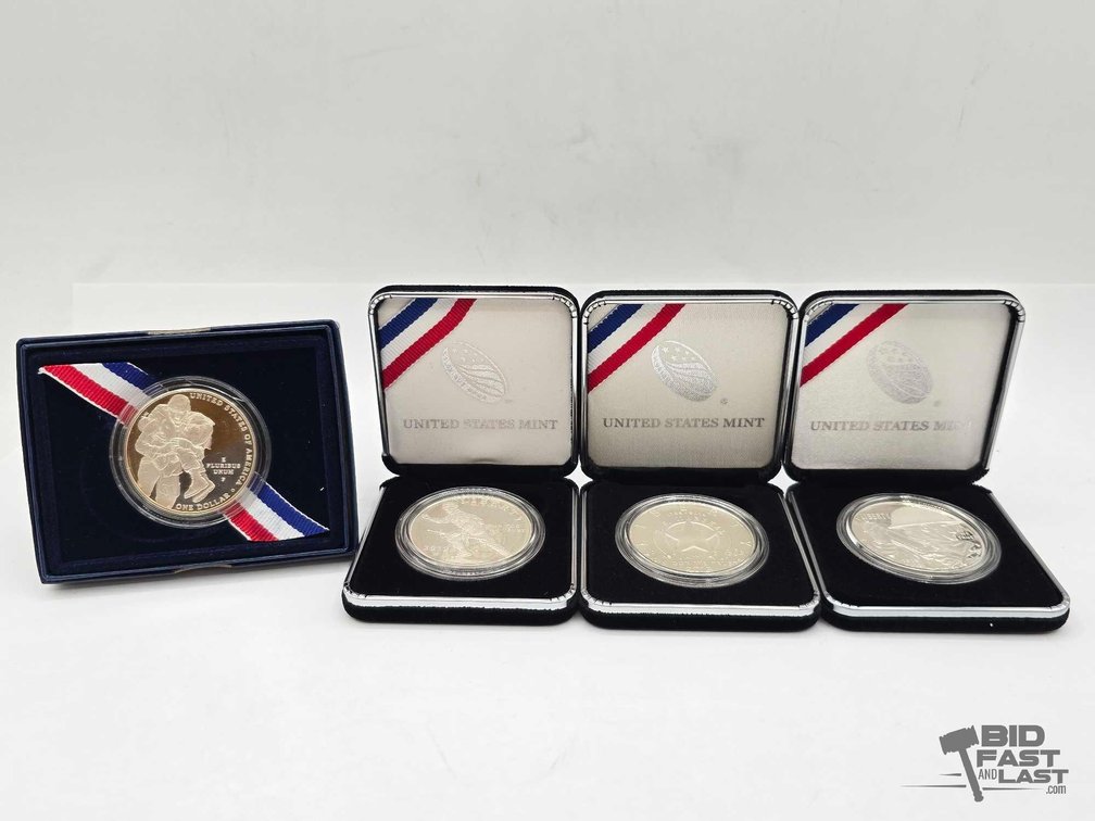 (4) Commemorative Silver Dollars
