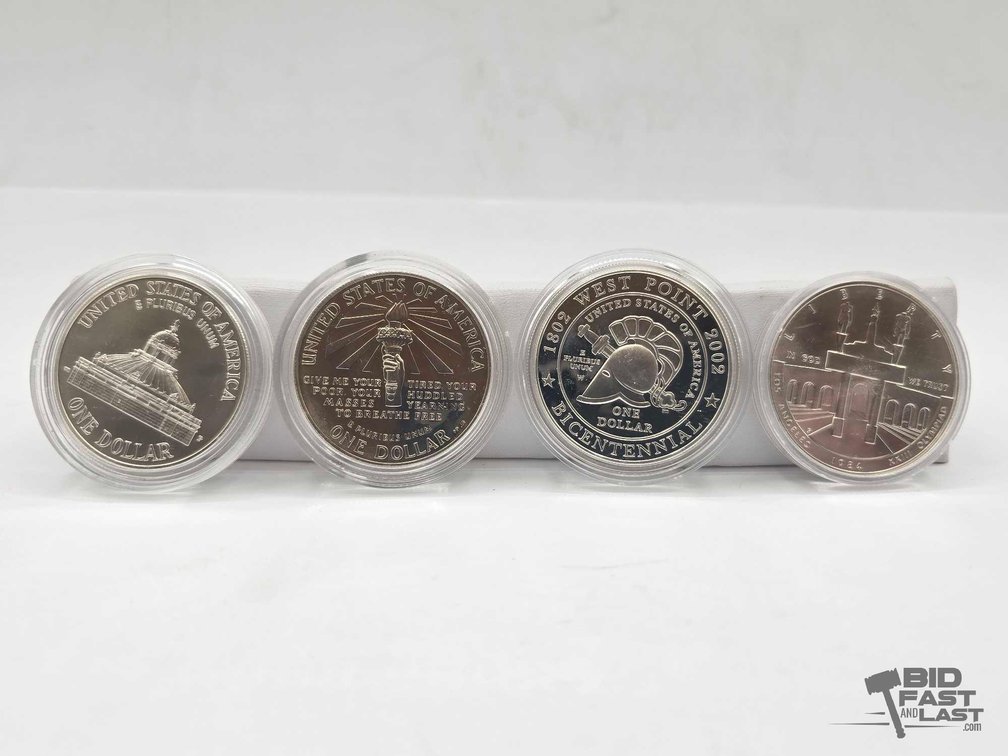 (4) Commemorative Silver Dollars