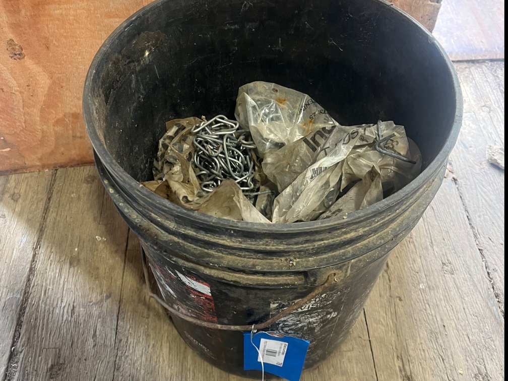 Bucket of T-Post Clamps