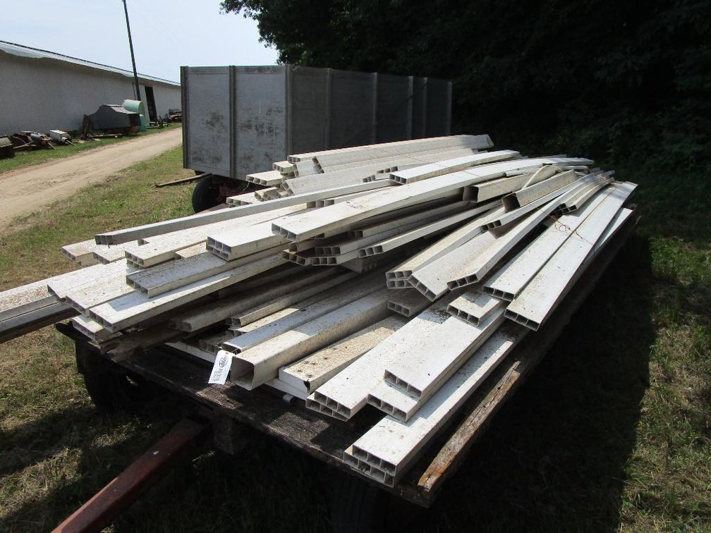 Pile of White Plastic Fence