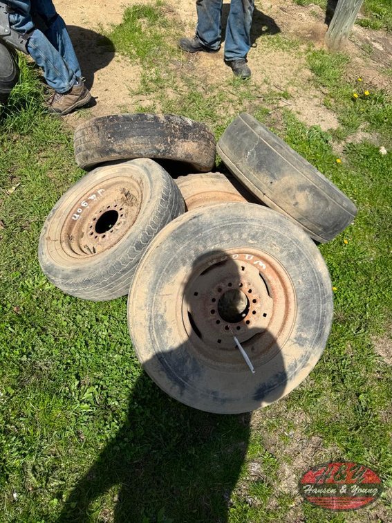 Pile of Implement Tires and Rims