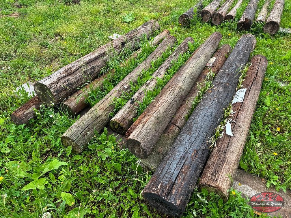 Pile of 8' Wood Posts