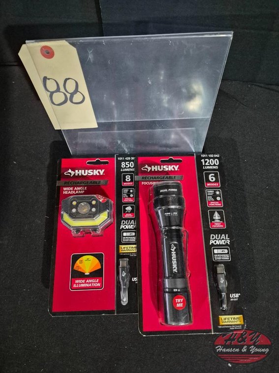 Brand New Husky 850 Lumens Dual Power LED Rechargeable Wide Angle Headlamp Model # PVL-HLP-0006 and Brand New Husky 1200 Lumens Dual Power LED Rechargeable Focusing Flashlight Model # PVL-FLT-0020