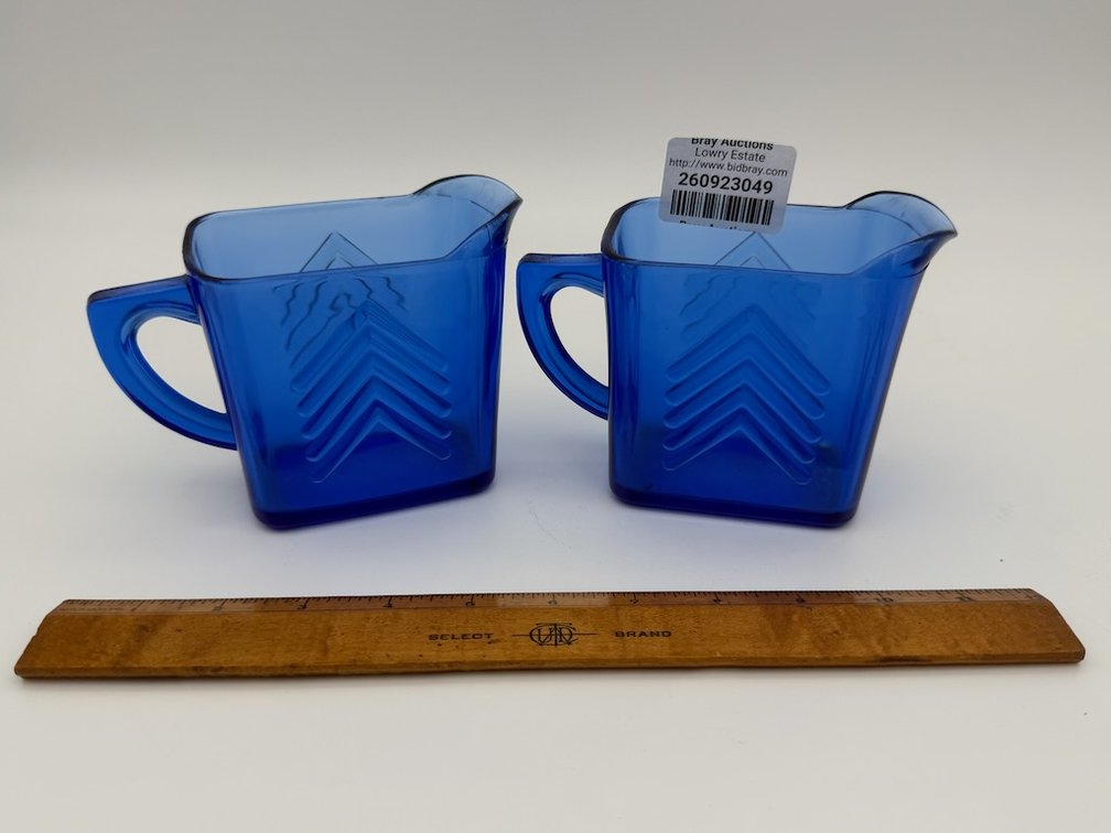 Set of Small Blue Glass Pouring Pitchers