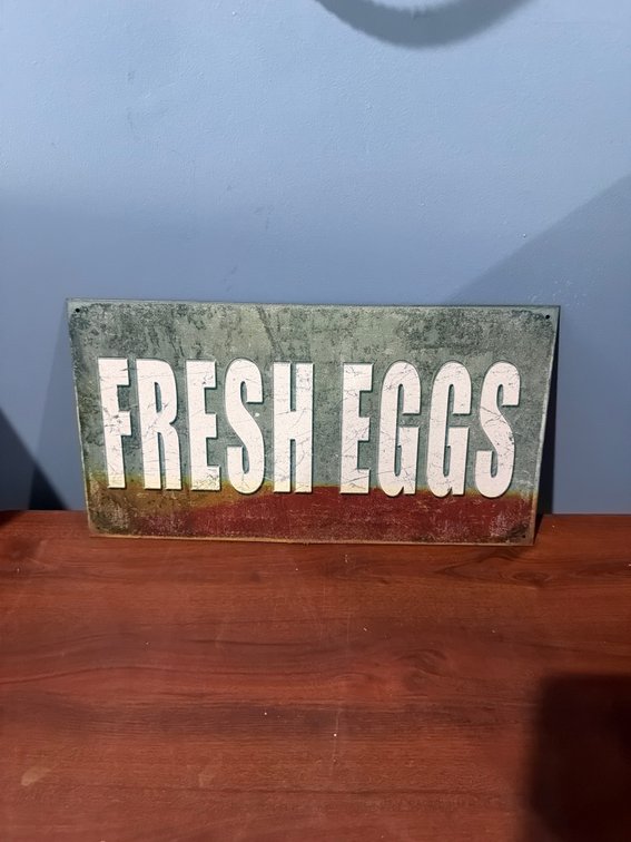 Tin egg sign