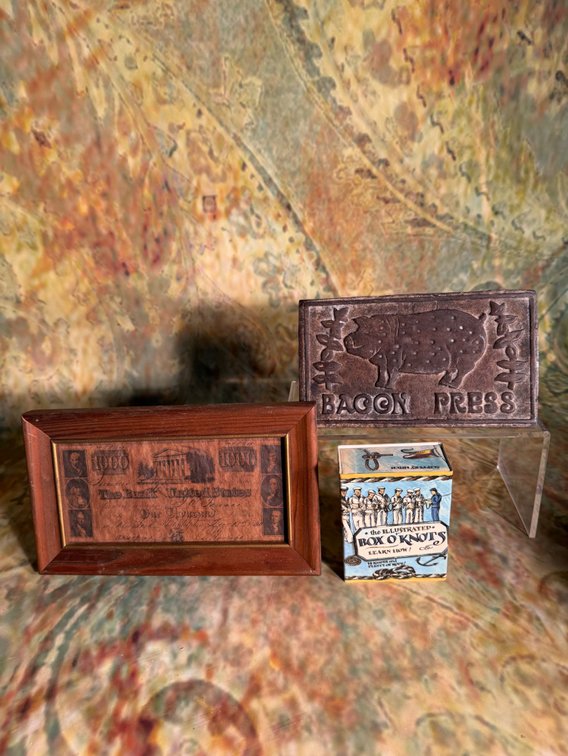 Vintage Collectibles Lot – Bacon Press, Framed Reproduction Currency & Illustrated Box of Knots