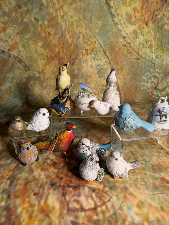 diverse collection of decorative bird figurines