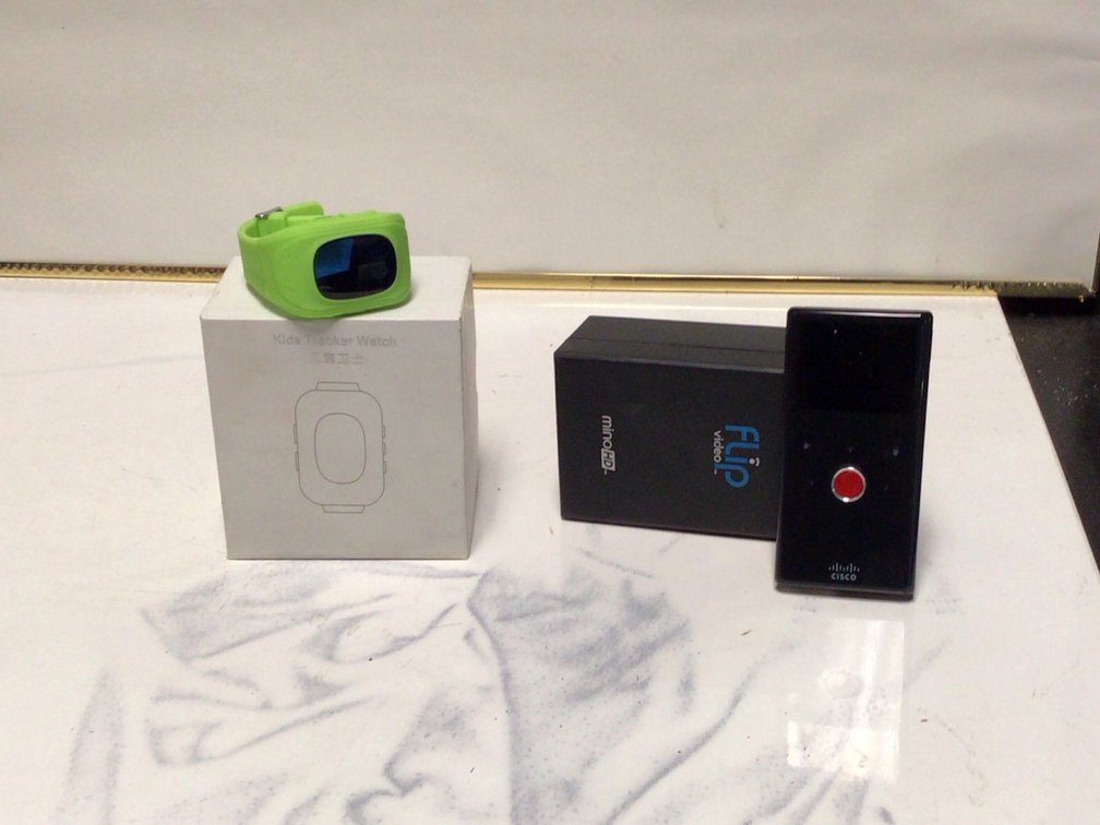 Kids Tracker Watch And Flip Micro HD Video Recorder Both New