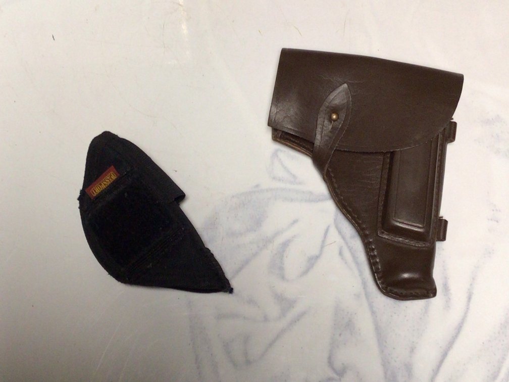 Small Calibur Pistol Holster Black And A Soviet Era Brown Leather Makarov Pm Pistol Holster