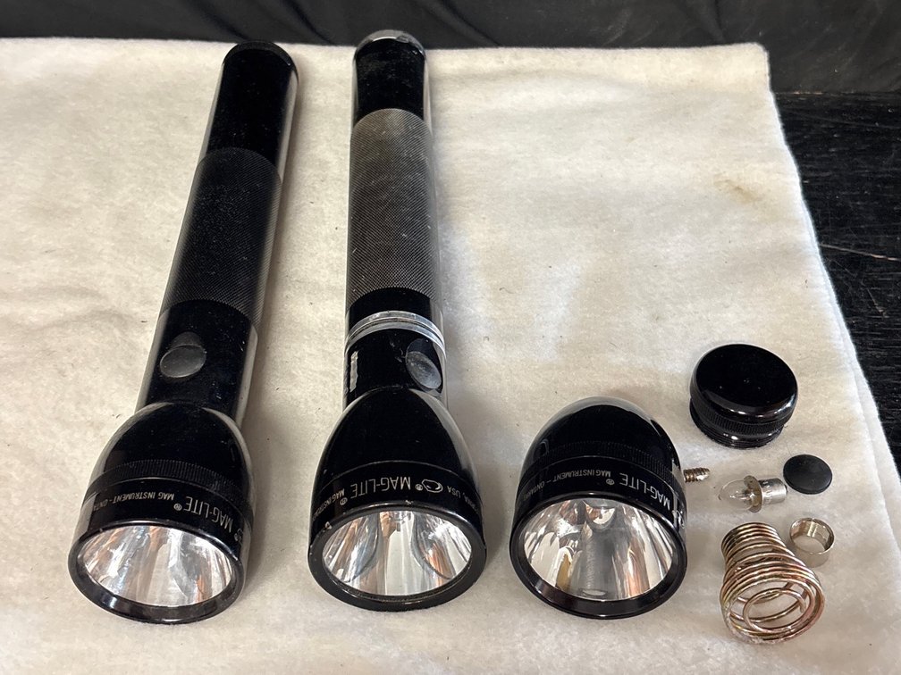 2 Mag-Light Flashlights W/Spare Parts