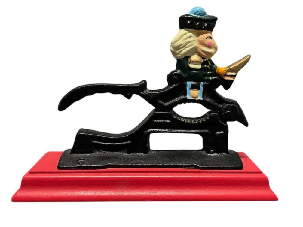 Hand-Painted Cast Iron Minute Man / Soldier Nutcracker on Red Wood Stand