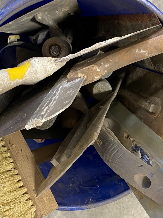 Bucket of tile laying tools