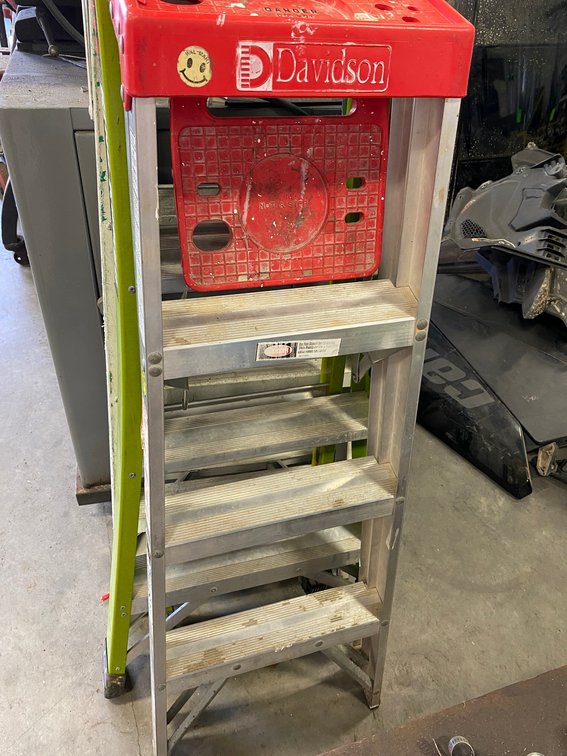3 Stepladders; one is fiberglass, Little Giant and a metal stepladder ranging from 5' to 4'
