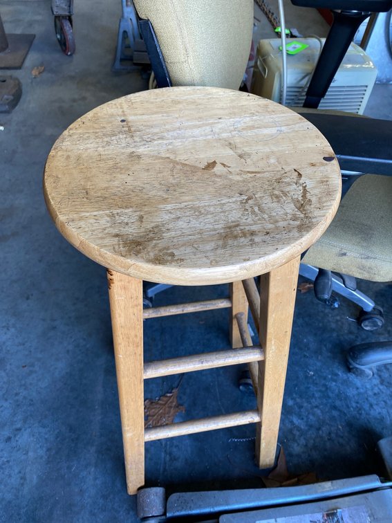 2 Wooden stools and an office chair