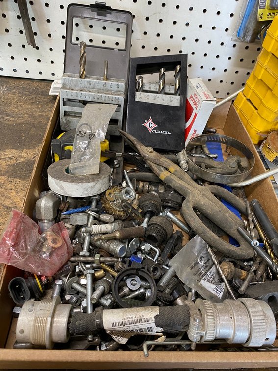 Flat of misc.:  Some DeWalt tools, screwdriver tips, face shield and contents right above the flat on the pegboard