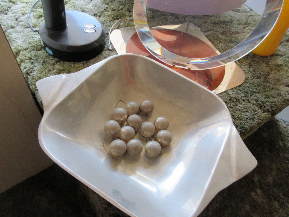 Aluminum fruit ball, hanging light, table light, artwork signed by Taska valued at $2500  - unique piece - w/ a lot of time and effort 