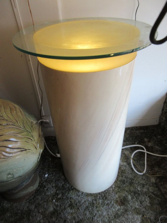 Lighted stand, large pottery piece