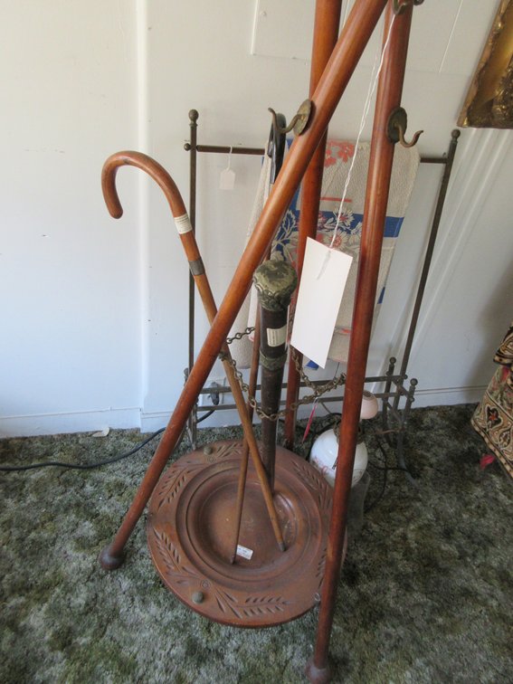 Coat stand, metal quilt rack and small lamp