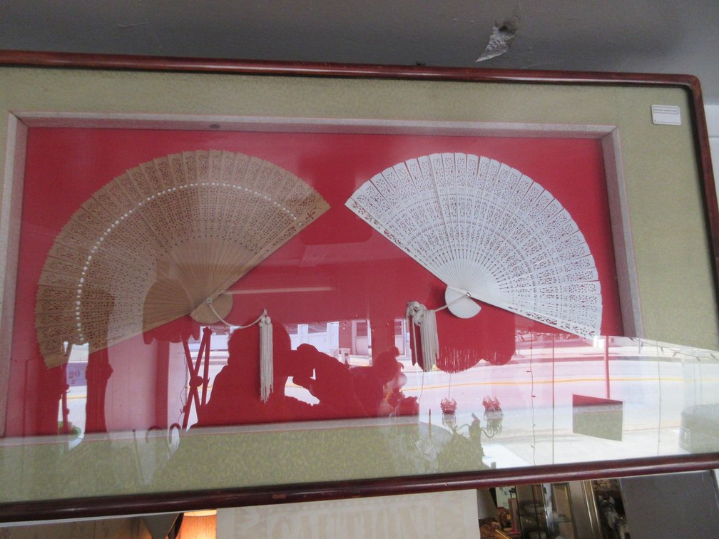 Oriental print of 2 framed oriental fans, 2 swag lamp shades