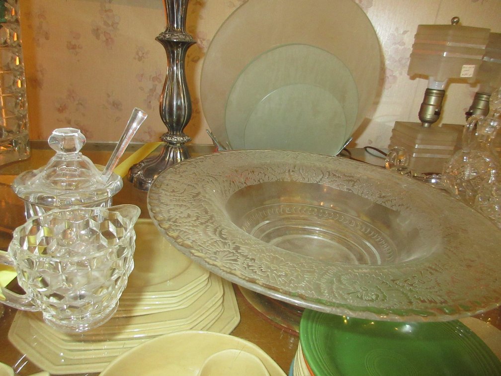 Assortment of glassware:  Cruets, some small deco vanity lamp and cream and sugar