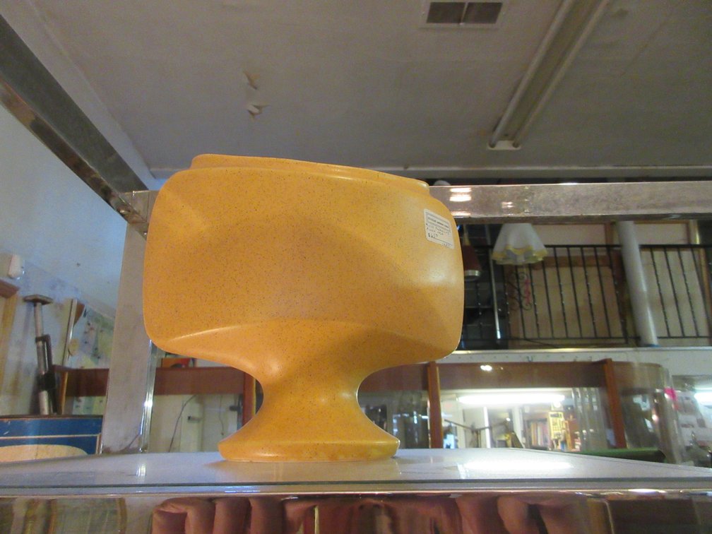 Contents on 2 shelves of the metal stand:  Molloy  pillow vase, Big Ben clock, some cut glass, few vases, 2 plastic cookie jars