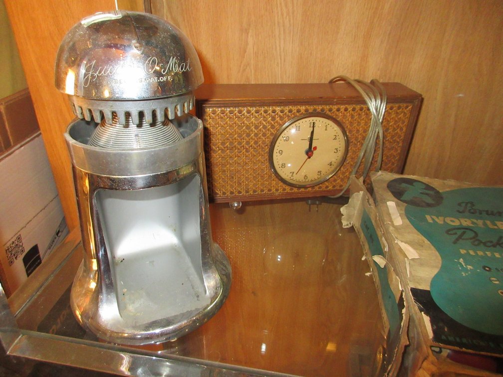 Ivory Dart pocket pool balls NIB (old), juicer, clock, some aluminum ware, pitchers, carving set