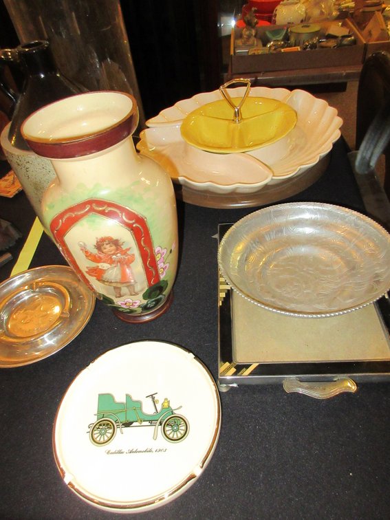 Lazy Susan server, old whiskey jug from Saltzman's Co., vase and some misc. items