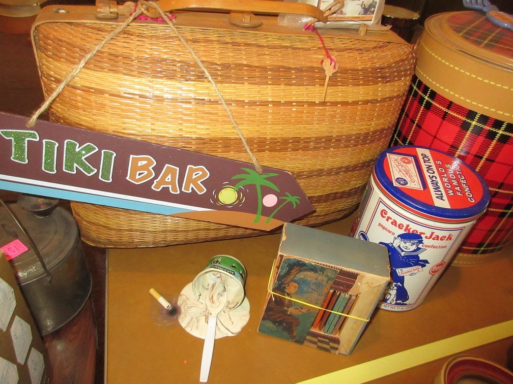 Wicker picnic basket and other picnic case, Cracker Jack can, misc. items