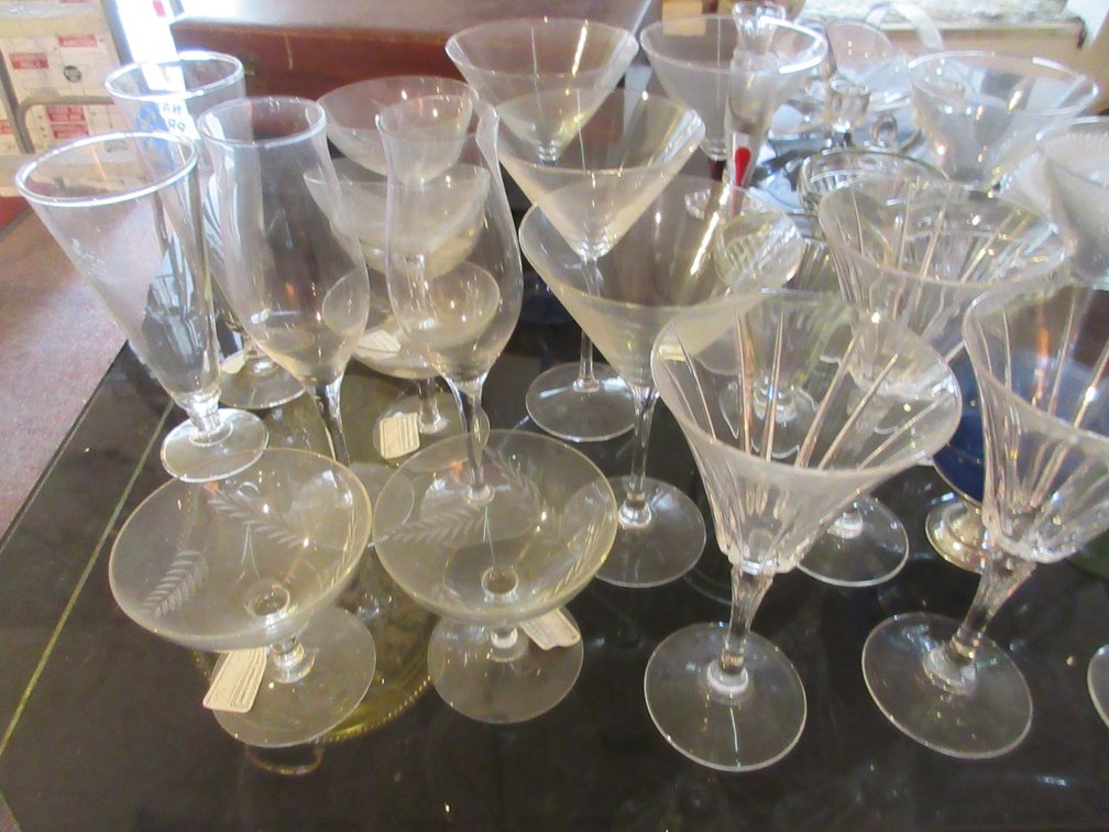 Assortment of glassware and glass plates, wooden box for flatware (empty)