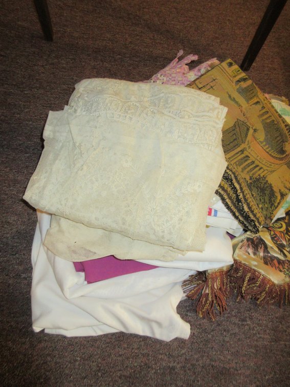 Some tapestry, assorted dry goods, blanket