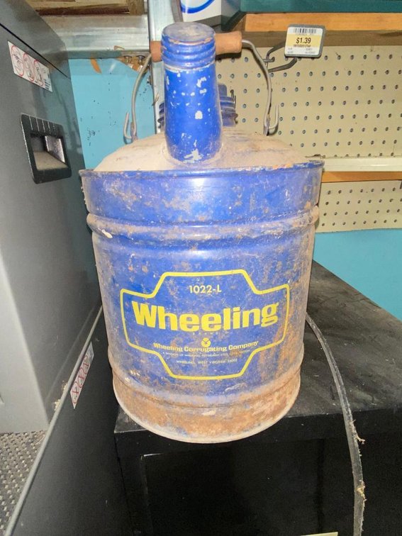Metal oil can by Wheeling Corrugating Co. Wheeling, WV