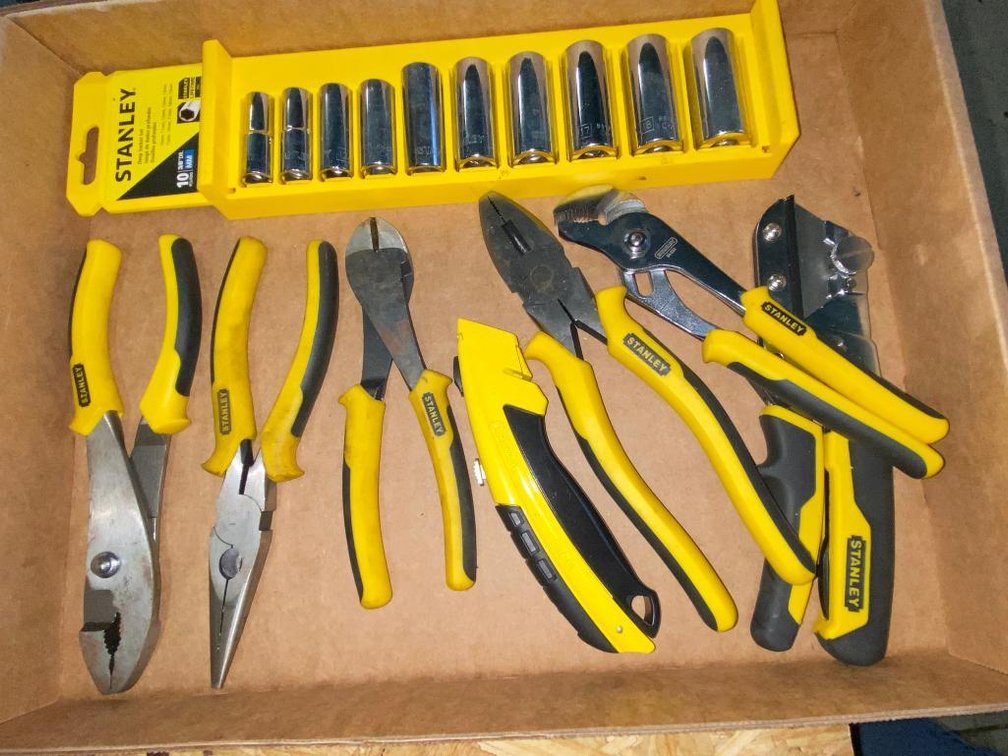Group of Stanley tools:  Pliers, snips and a Stanley deep socket 3/8" drive 10-piece metric set