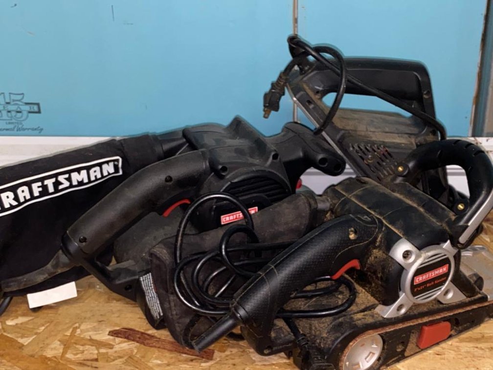 Craftsman 3x21 belt sander, 2 Craftsman belt sanders and a Black & Decker sander