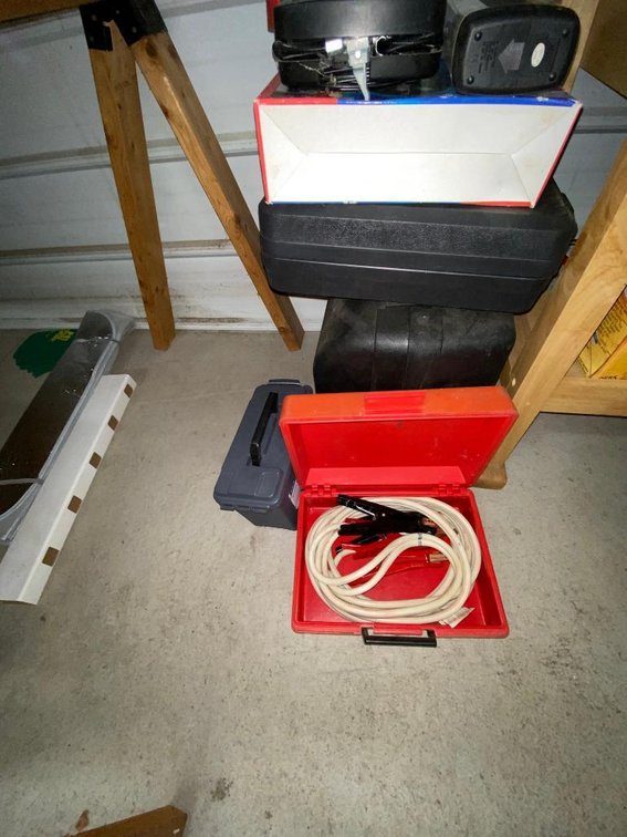 Jumper cables, air pump, empty storage container boxes