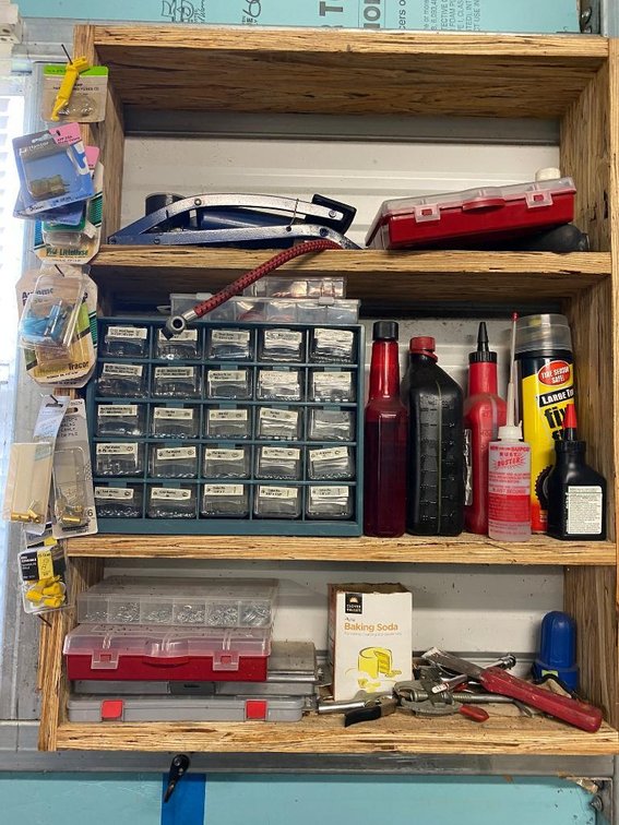 Contents of shelf:  Snap rings, washers, screws, electrical connectors