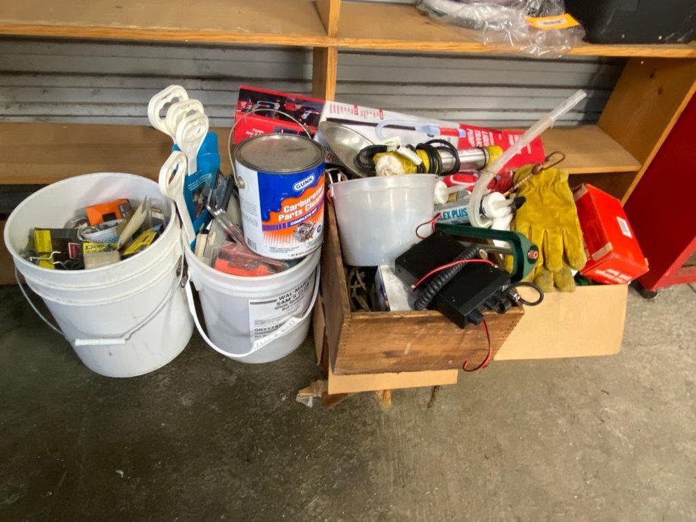 Contents of floor:  Shop light, CB radio, gloves, carburetor parts cleaner and other items