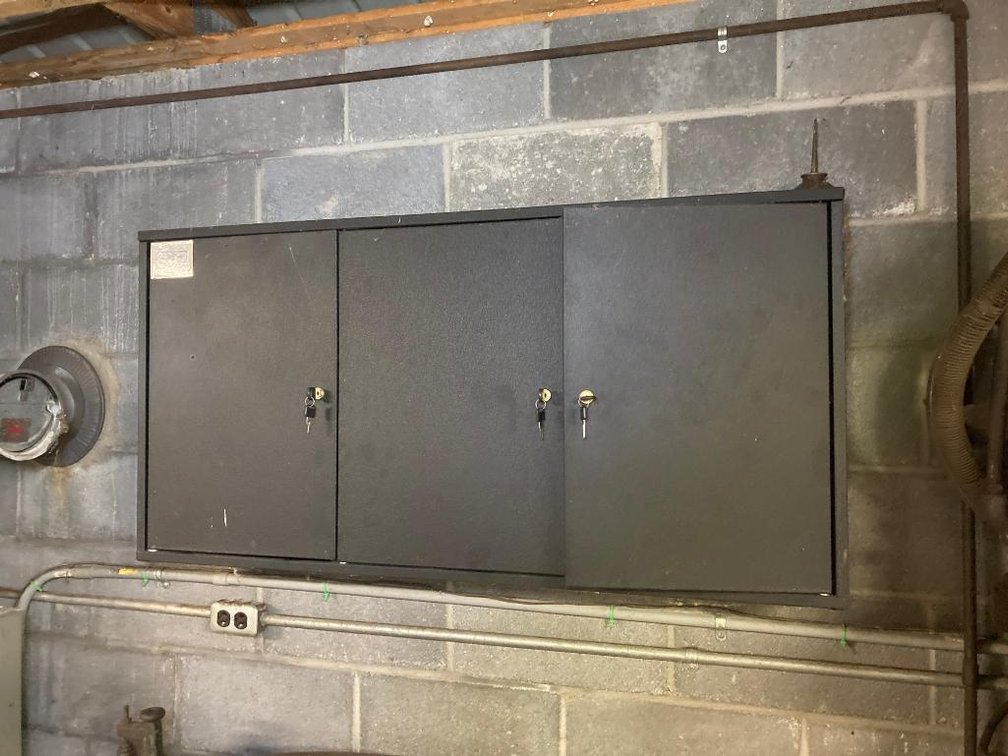 Hanging tool cabinet w/ key