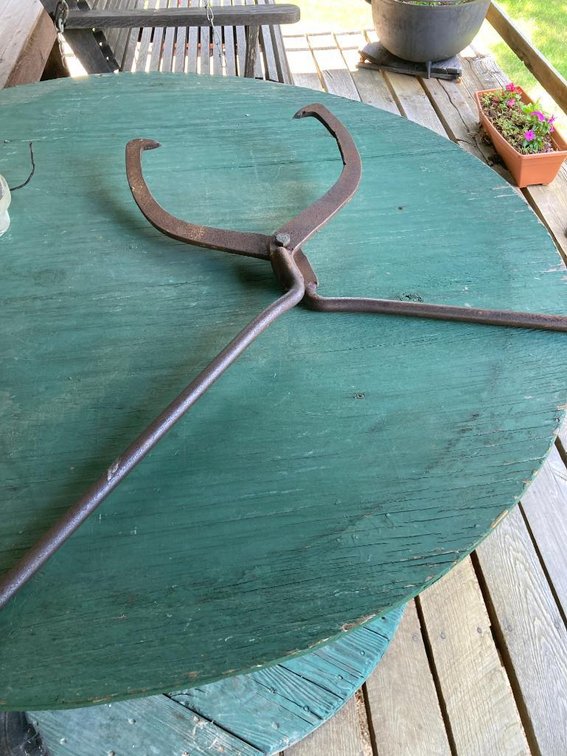 Large set of cast iron ice tongs