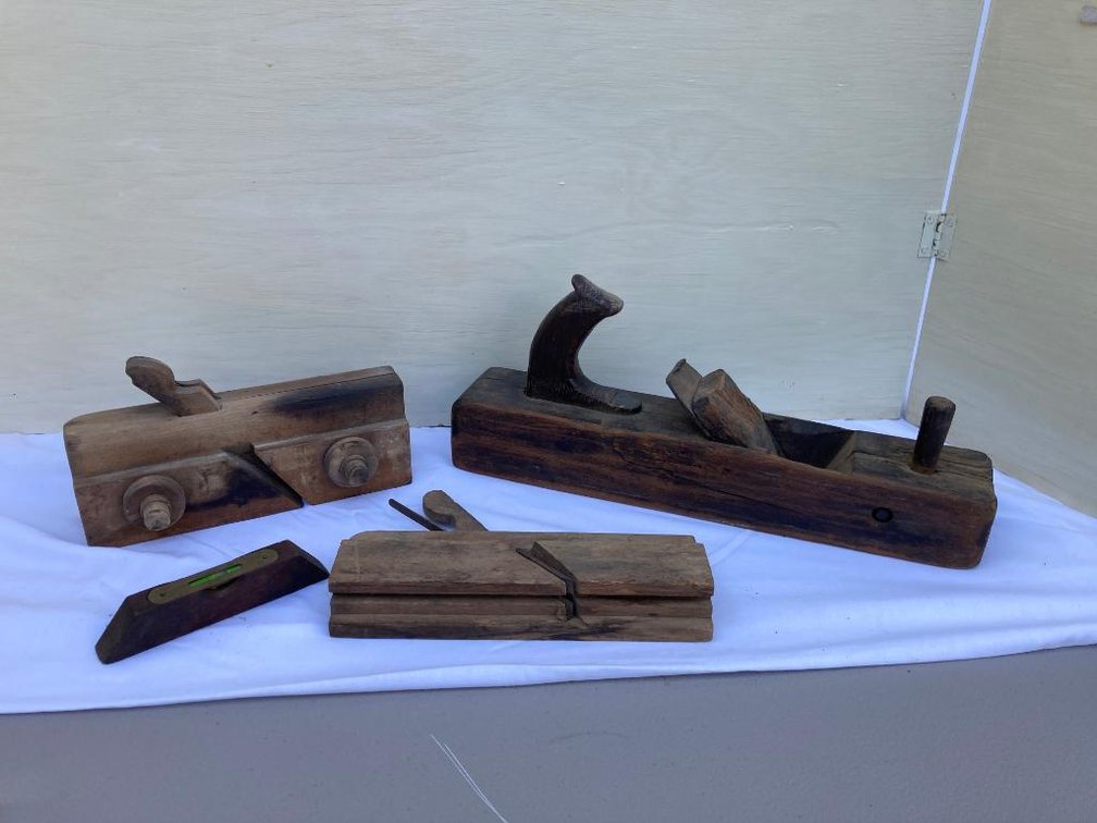 Antique hand tools:  Wood block plane, other planes