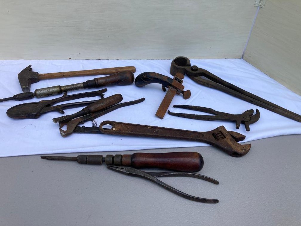 Lot of vintage hand tools:  Wrench, pliers, awl, etc.