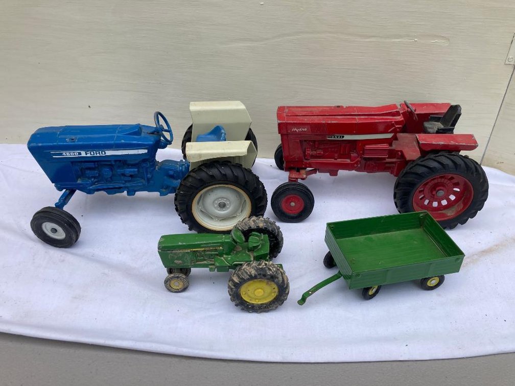 Pressed steel toy tractors, probably Ertl