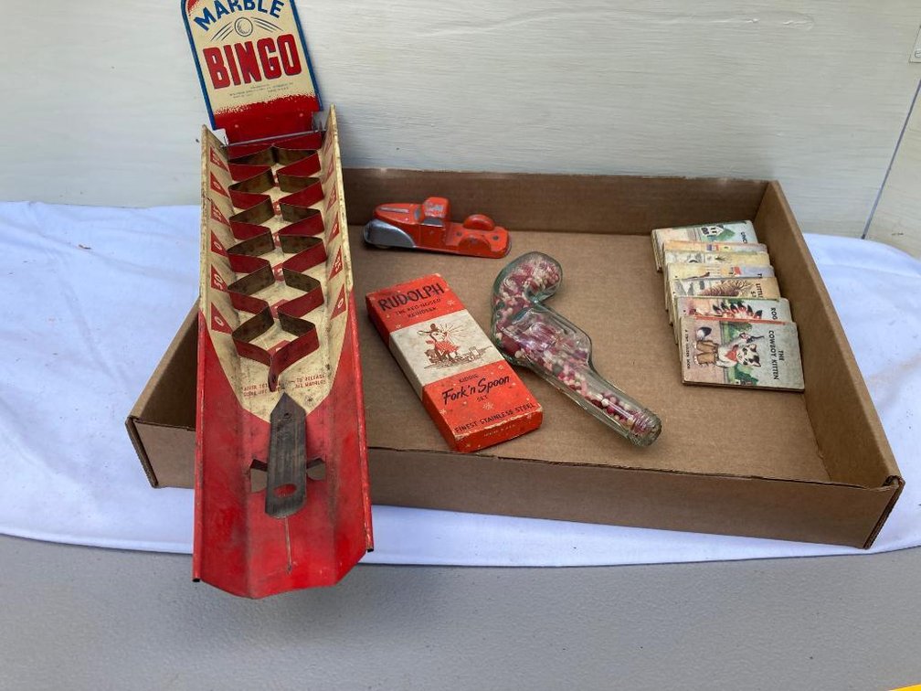 Lot of children's items:  Glass pistol candy container, Rudolph fork and spoon, marble tin bingo game, Tiny Golden Books