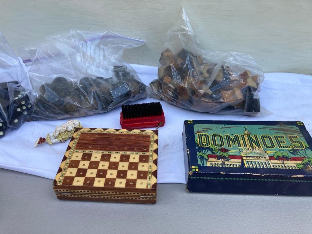Lot of games w/ dominoes and checkers, etc.
