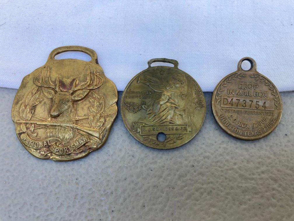 Lot of fobs: National Sportsman, Bronze Paris 1889 Exposition, Exxon Travel Club
