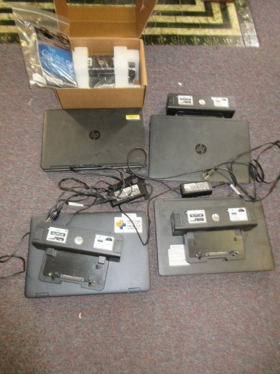 3 Hewlett Packard laptops and charging port