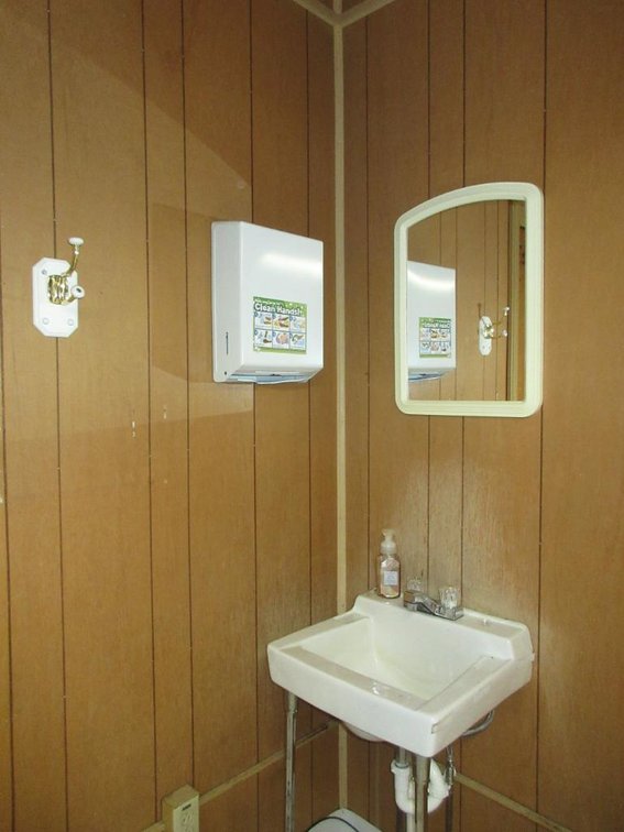 Sink, mirror, paper towel dispenser